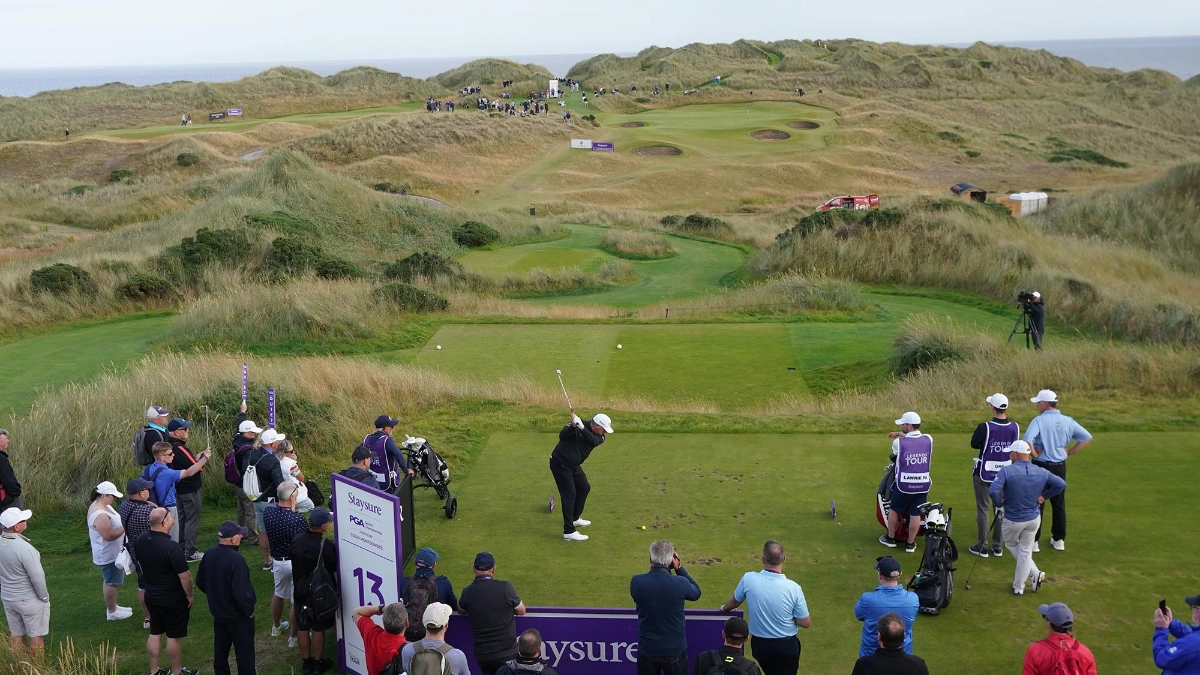 an image of a golfer playing staysure legends tour while crowd watching him