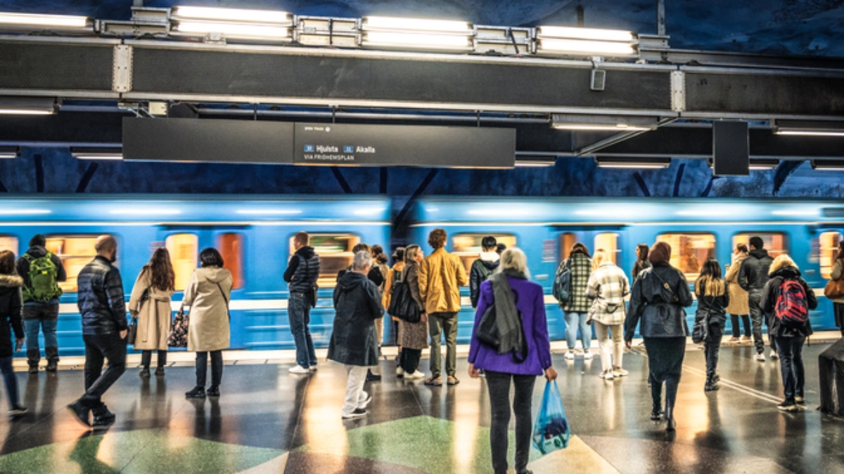 an image of crowded metro platform in Europe