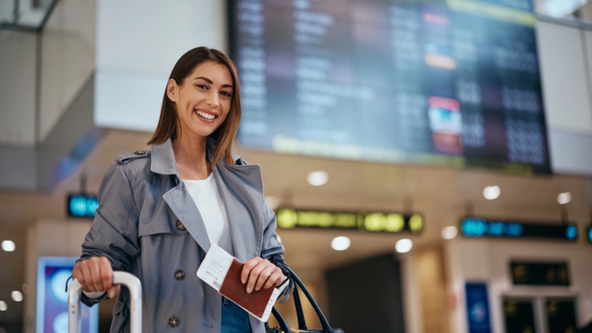 traveller with passport airport