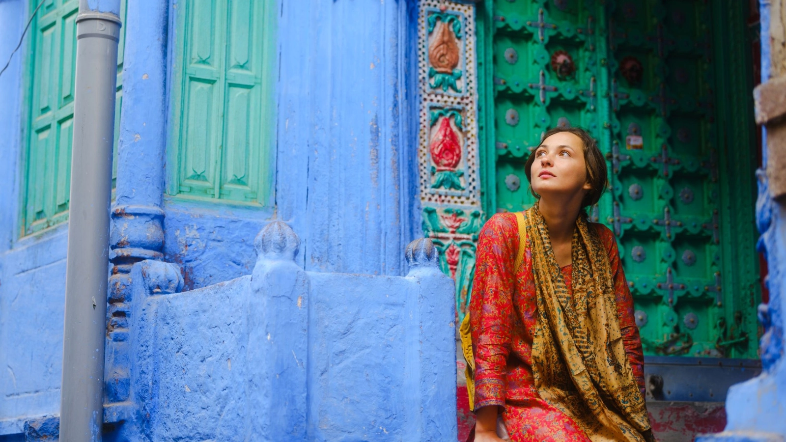 Woman exploring Jodhpur blue city during her trip to India