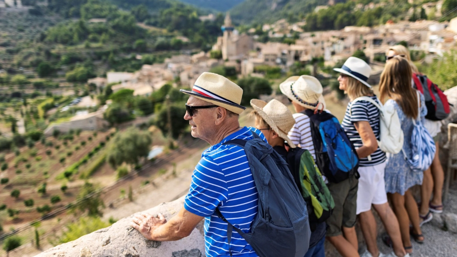 Family sightseeing beautiful town of Valldemossa, Majorca, Spain