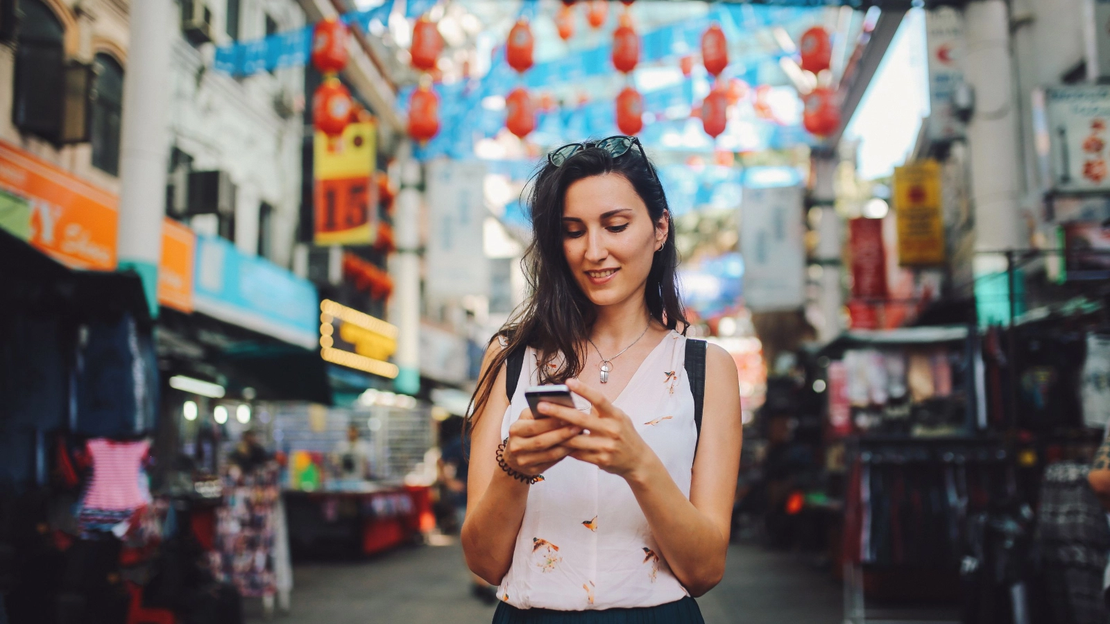 Female traveller walking in Kuala Lumpur Chinatown district
