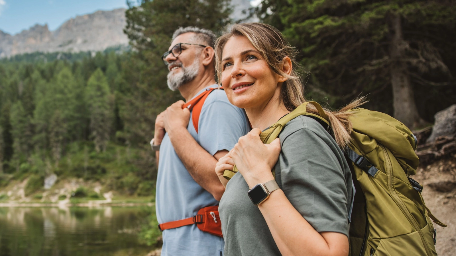 A couple hiking through a valley in Italian Dolomite